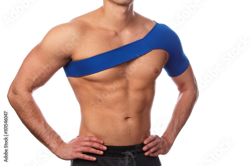 Man with a support bandage on his shoulder