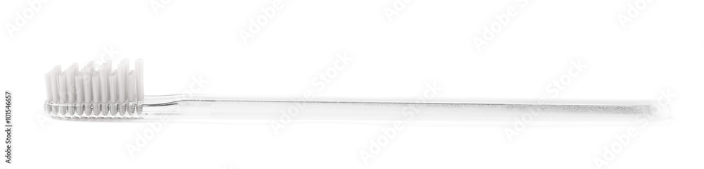 Brand new plastic toothbrush isolated Brand new plastic toothbrush isolated