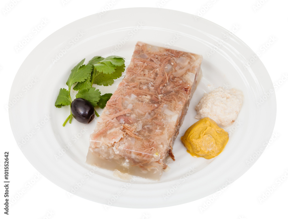 portion of beef aspic with seasonings on plate