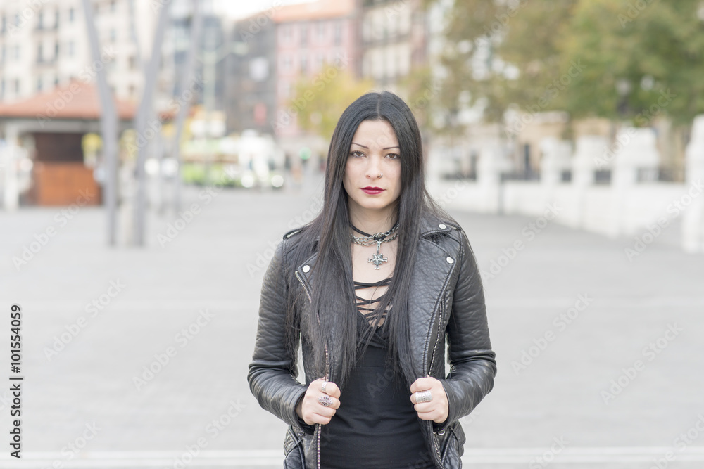 Urban portrait of beautiful woman heavy metal style. Stock Photo | Adobe  Stock
