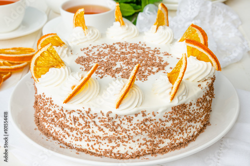 sponge cake with oranges and chocolate chips photo