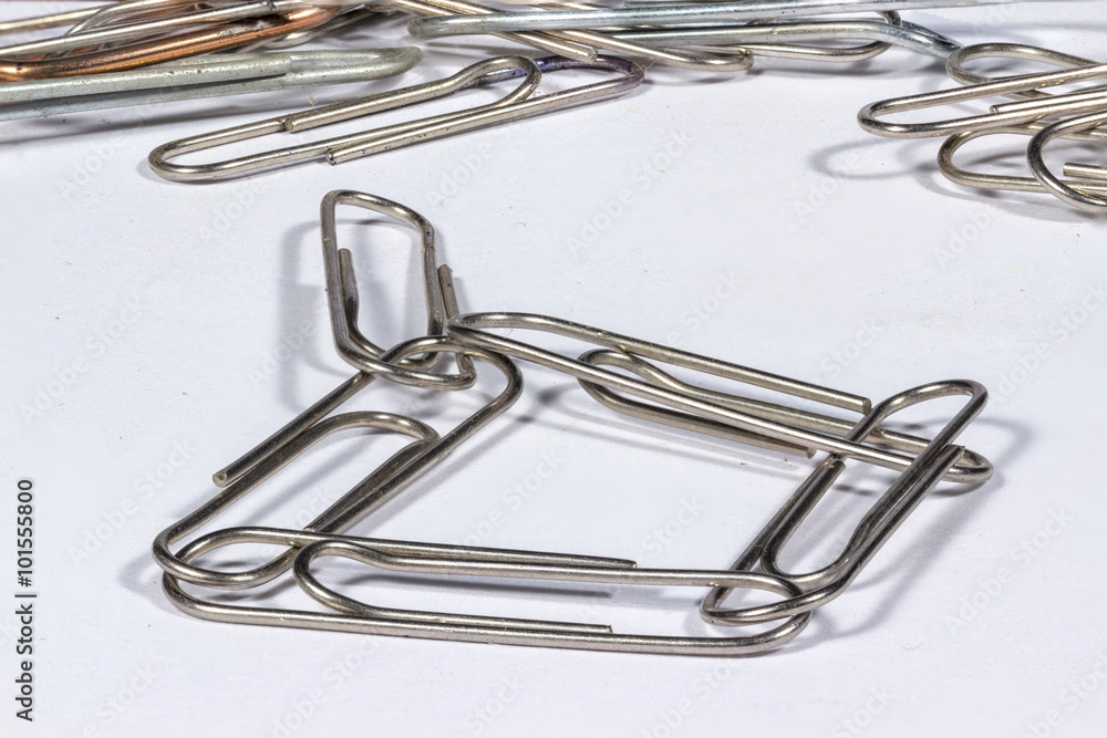 Several interlocked paper clips Several interlocked paper clips