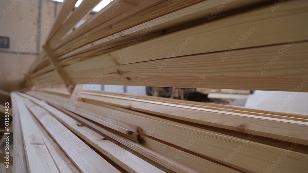 A stack of wooden boards, timbers in a carpentry workshop
A stack of wooden boards, timbers in a carpentry workshop