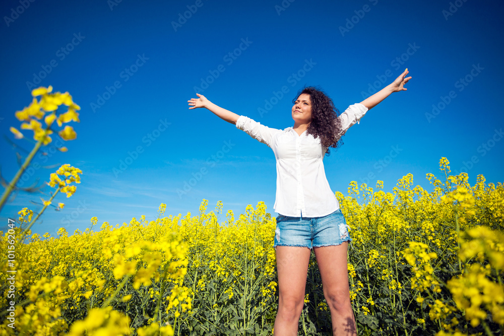 Fototapeta premium young beautiful girl in the field