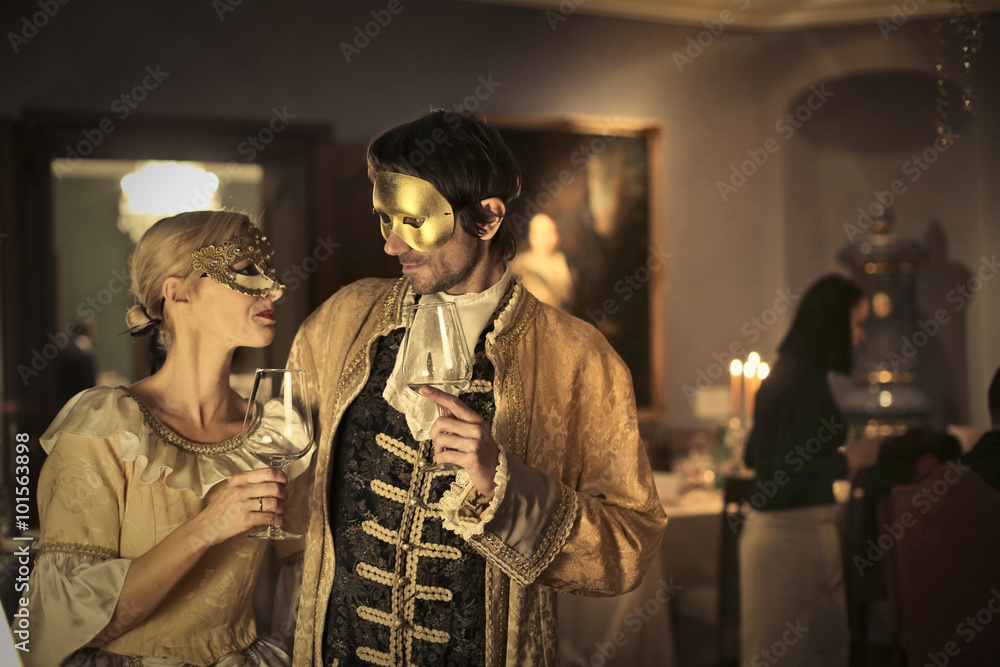 Photography Masked couple drinking wine