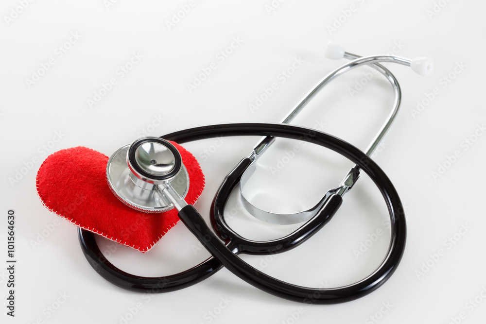 Red heart and a stethoscope on white background Red heart and a stethoscope on white background