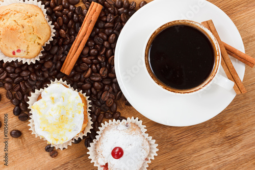 Sweet muffin and coffee. Ov...