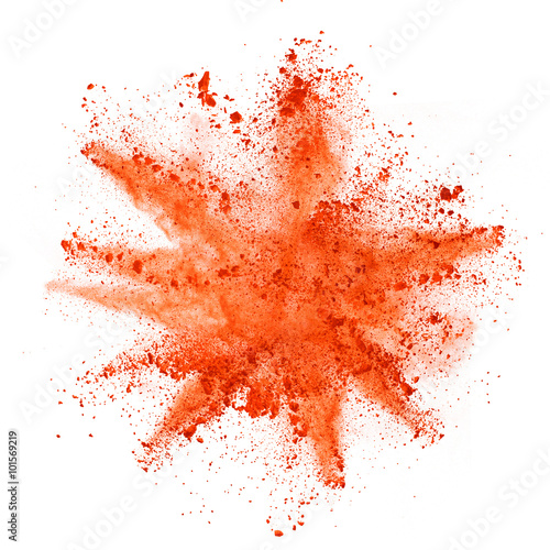 Explosion of orange powder on white background