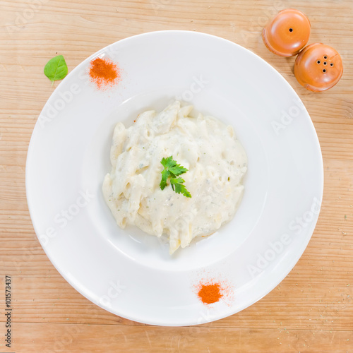 Penne pasta with a creamy sauce - Top view