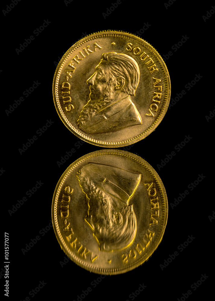 Krugerrand gold coin and reflection Krugerrand gold coin and reflection