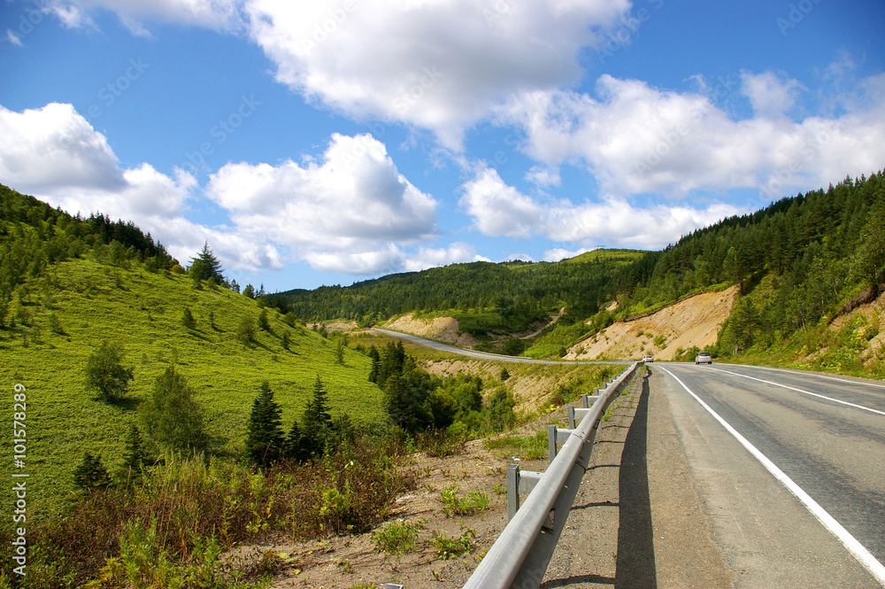  Mountain road on island Sakhalin by summer