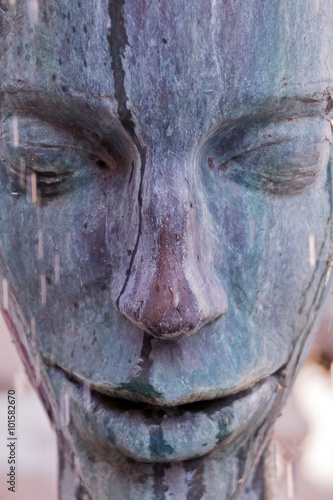 Sculpture from the front face with eyes closed
