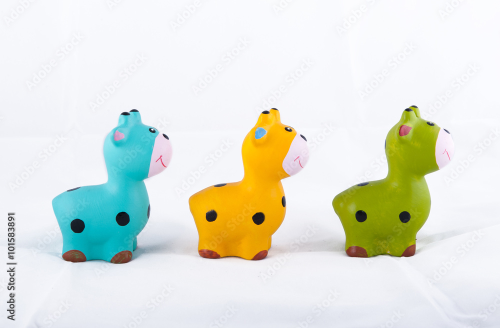 giraffe doll isolated on white background. giraffe doll isolated on white background.