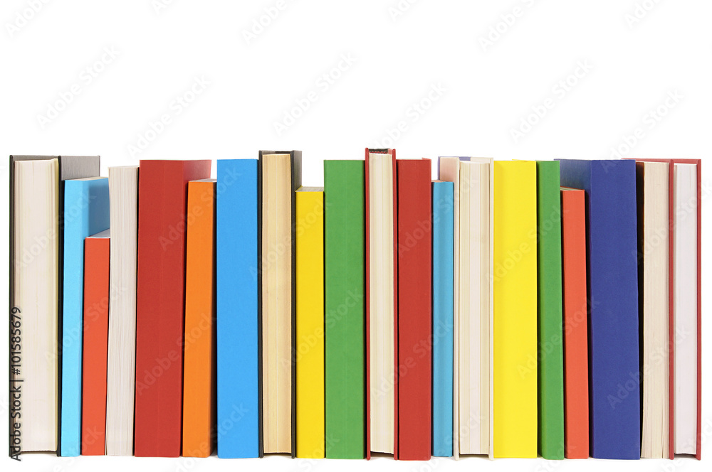Naklejka premium Row line of colorful books isolated on white background school college library bookshelf photo