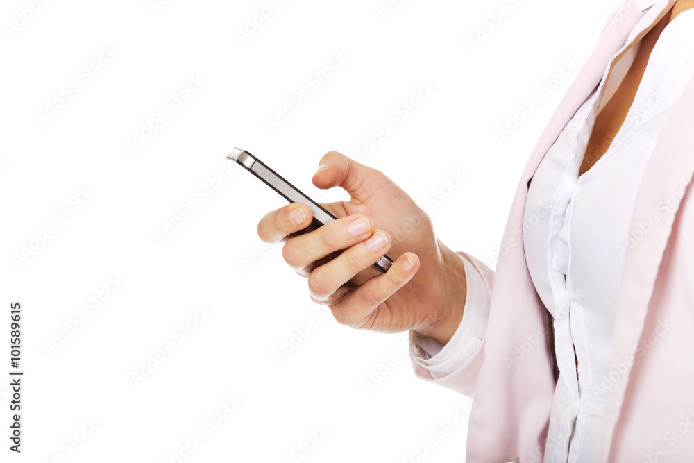 Young business woman using a mobile phone Young business woman using a mobile phone