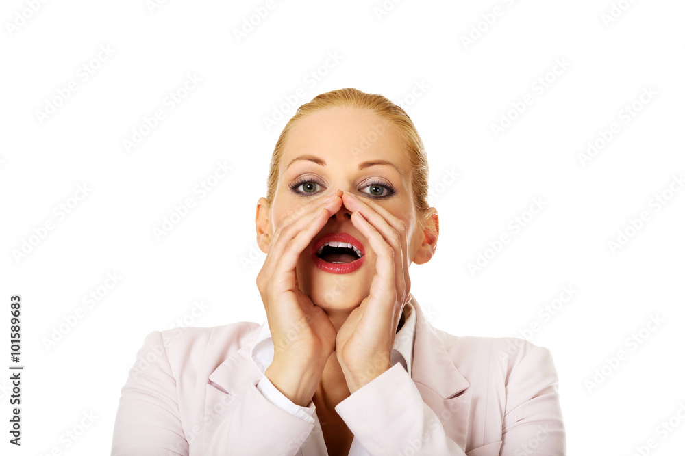 Young smiling business woman screaming loud or calling someone Young smiling business woman screaming loud or calling someone