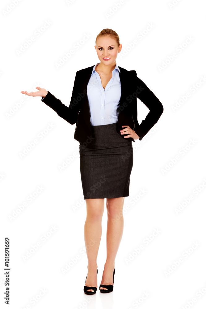 Business woman presenting something on open palm Business woman presenting something on open palm