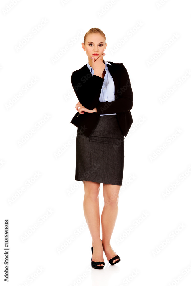 Young serious thoughtful business woman Young serious thoughtful business woman