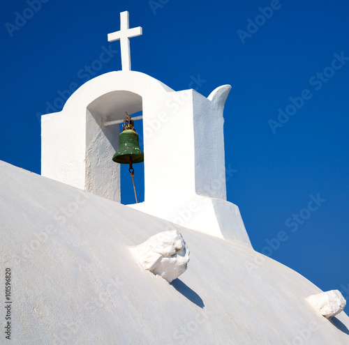 cross in santorini greece old construction and the sky