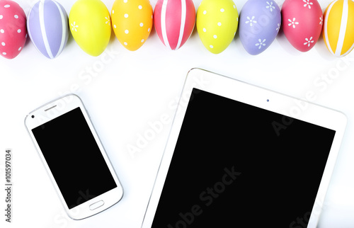 Easter eggs with smart phone and tablet