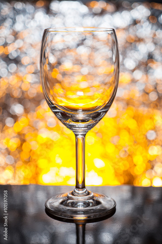 Wine glass background bokeh bright colors.