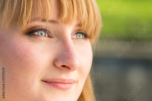 Young confident student girl with grey eyes