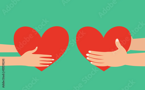 Male and female hands giving heart