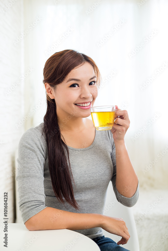 Woman enjoy a glass of tea Woman enjoy a glass of tea