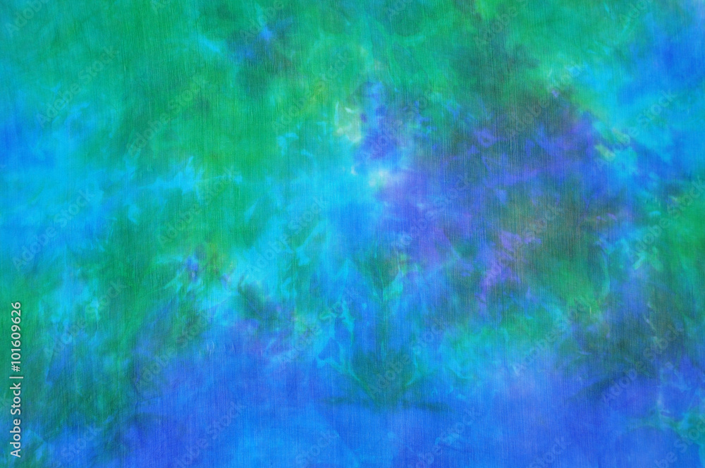 Beautiful blue and green tie dye silk fabric background Beautiful blue and green tie dye silk fabric background