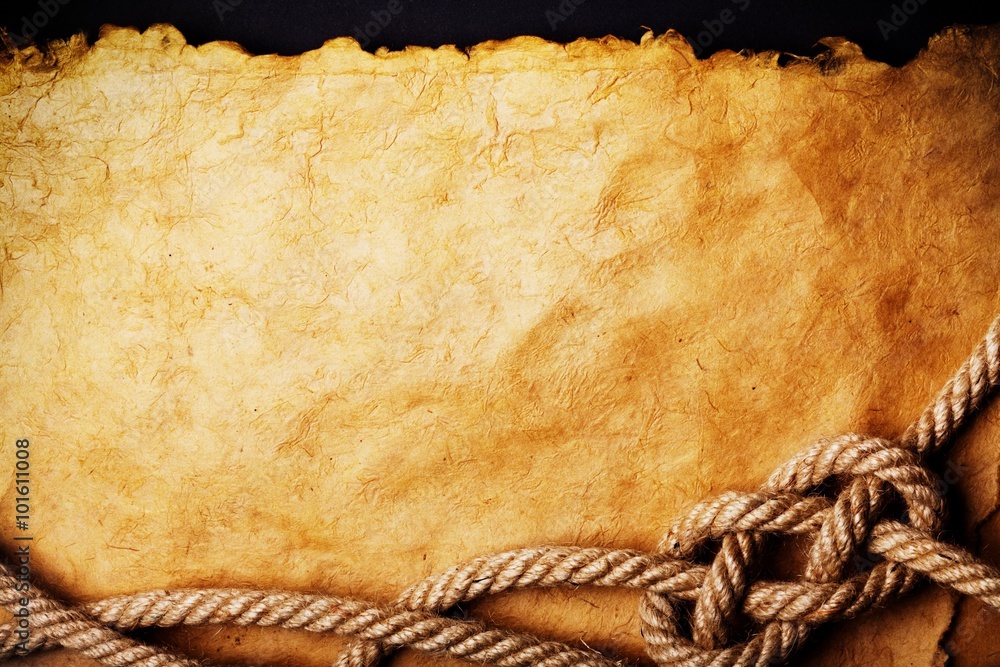 Fotografie aged Rope on the old paper background