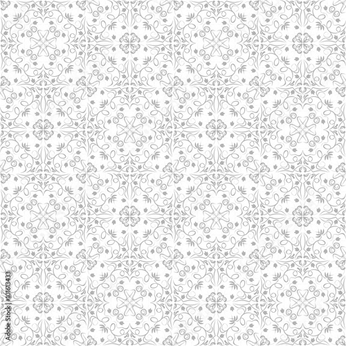 Low contrasting vintage ornament, gray drawing on white background. Repeating filigree geometric patterns in victorian style.
