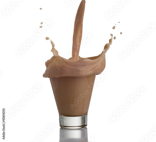 Milk chocolate splash isolated over white background