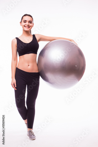 woman making exercise with pilates ball, against white background © F8  \ Suport Ukraine