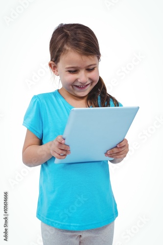 Standing girl using tablet