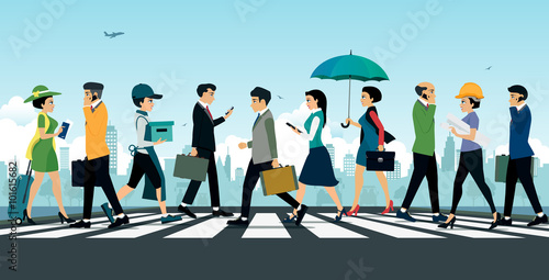 Businessman walking on the crosswalk with the city as a backdrop.

