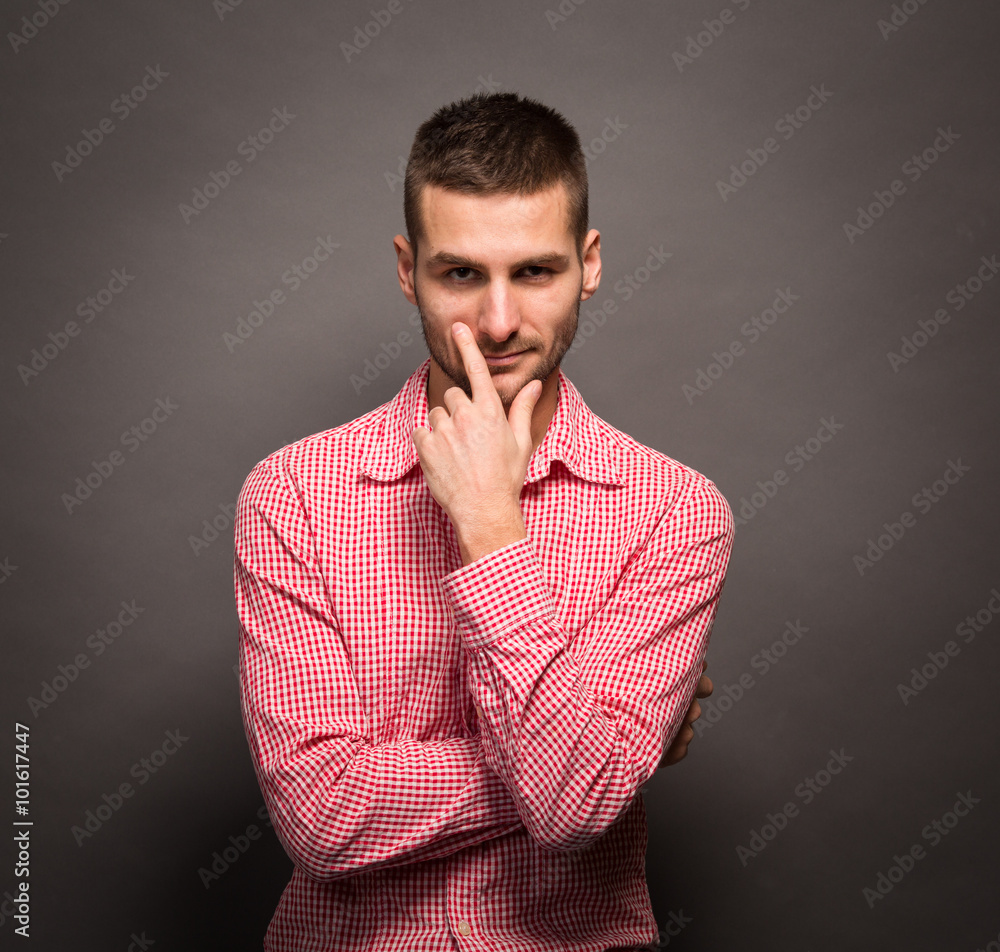 Thoughtful man in studio Thoughtful man in studio