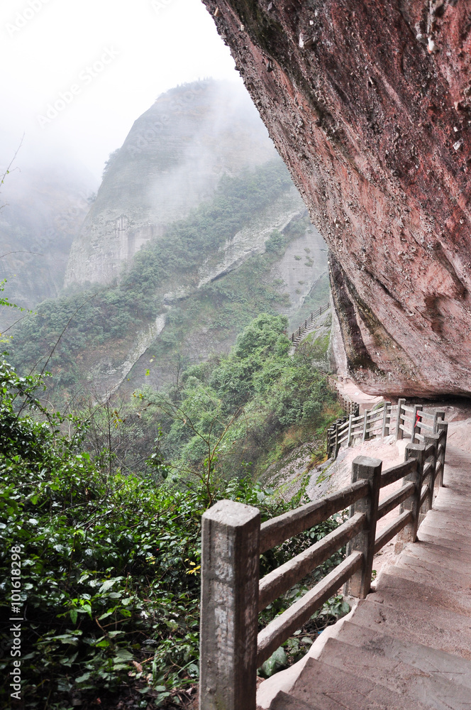 The breathtaking mountain path in mist