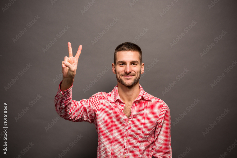 Naklejka premium Handsome man showing okay sign