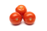 three ripe tomatoes on a white background