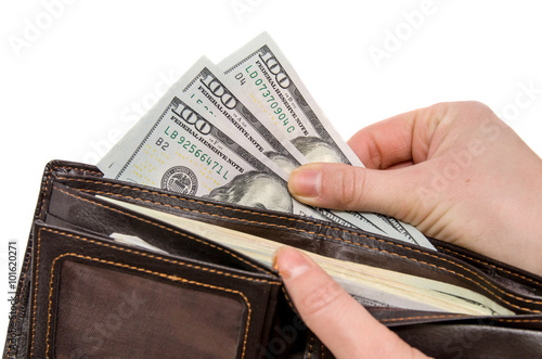 wallet with dollars in the woman hands isolated