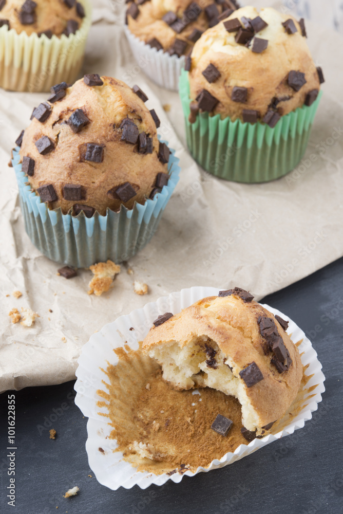 muffins with chocolate on a stone tray muffins with chocolate on a stone tray