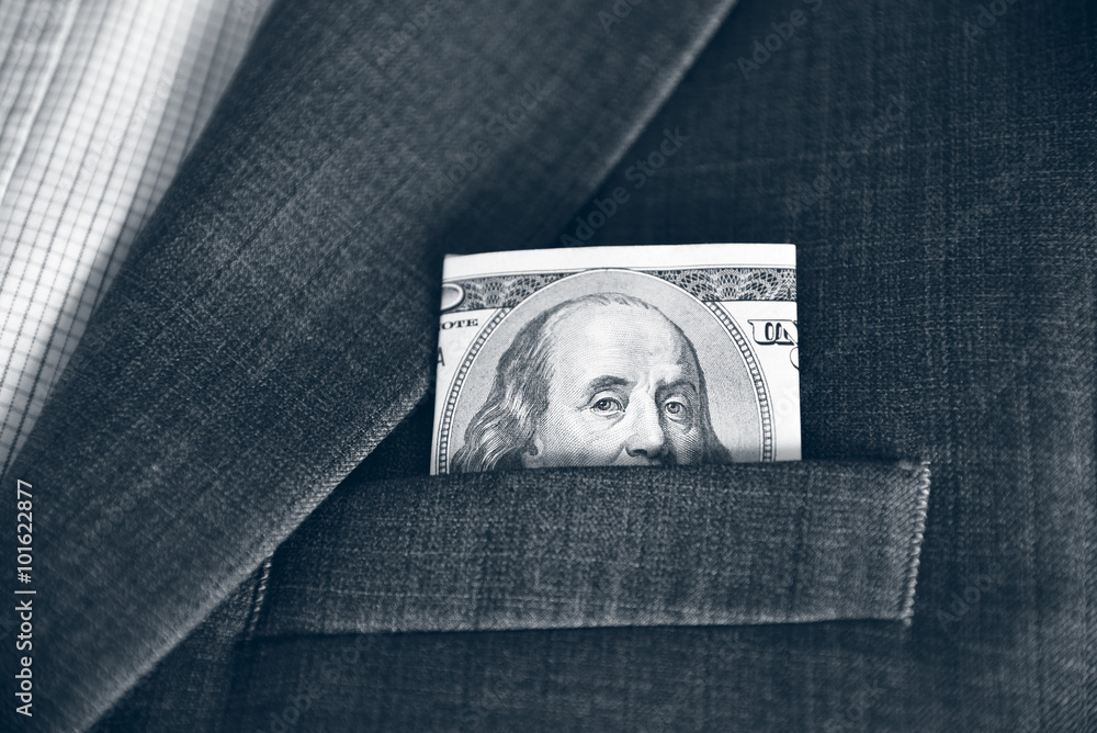 Dollars in the pocket of his jacket (corruption, lobbying, bribe