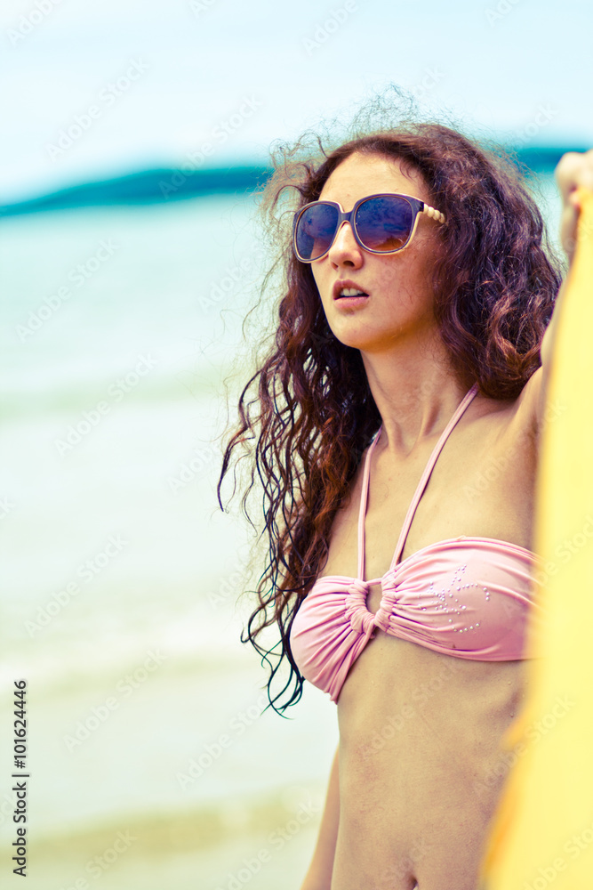 girl on the beach. Girl on the beach . Rest and travel in Thailand. Pink swimsuit , glasses in a white frame. Happily playing on the beach and enjoying life . girl on the beach. Girl on the beach . Rest and travel in Thailand. Pink swimsuit , glasses in a white frame. Happily playing on the beach and enjoying life .