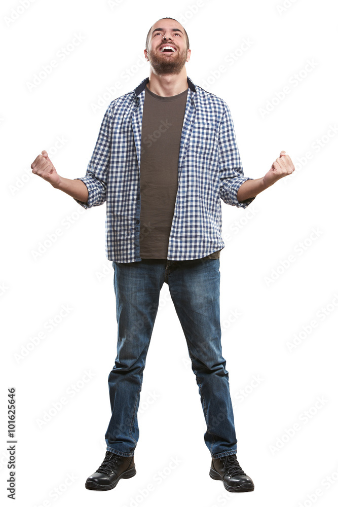 An excited young man celebrating the success isolated on white background An excited young man celebrating the success isolated on white background