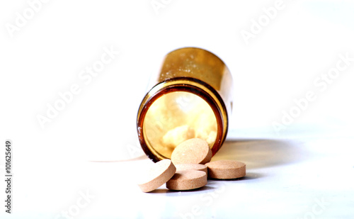 Pills out of a medicine bottle © bellakadife
