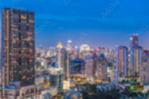 Blurred abstract night city background.blur construction structure backgrounds concept. © tokkyneo