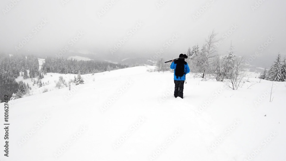 Photographer in winter mountain Photographer in winter mountain