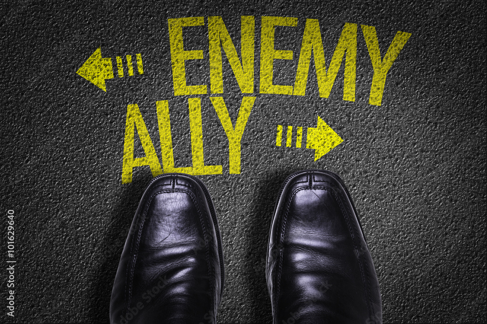 Ταπετσαρία Top View of Business Shoes on the floor with the text: Enemy - Ally