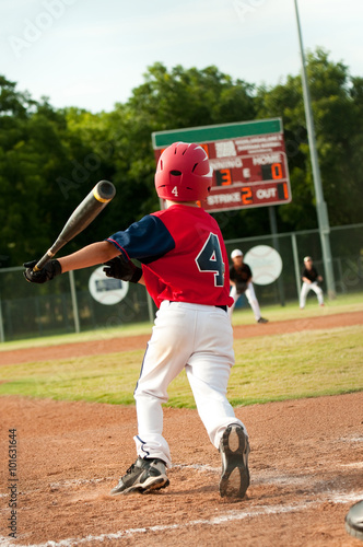 American baseball player ready to run to first base