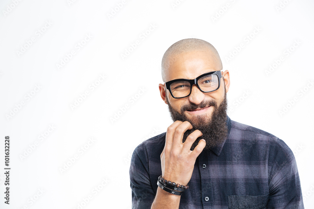 Handsome african american man in glasses scratching his beard Handsome african american man in glasses scratching his beard